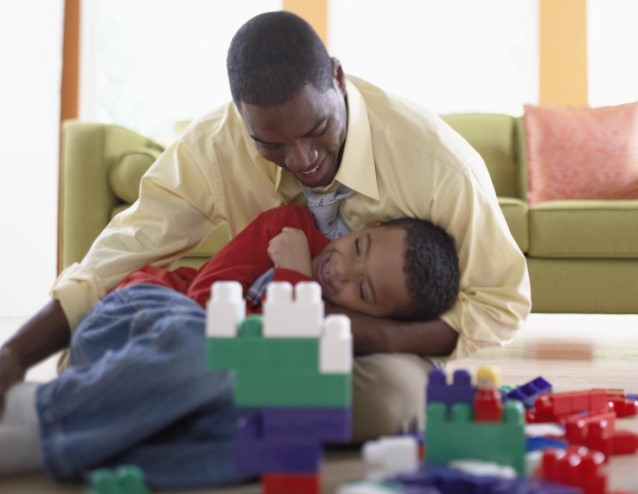 Parent and child engaging in play-based learning activities as part of ABA training to enhance social and cognitive skills | Adora Bright parent and child engaging in play-based learning activities as part of aba training to enhance social and cognitive skills